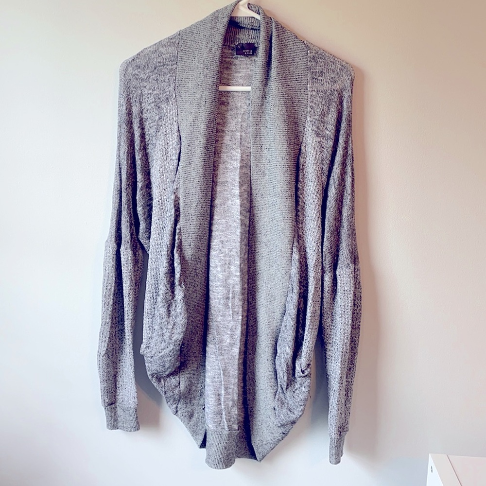 Grey knit cardigan.